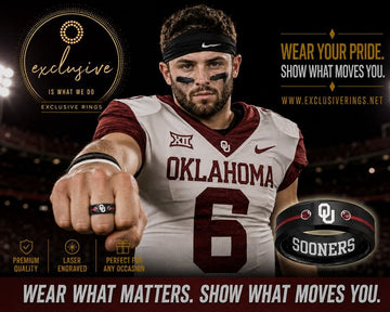 Promotional ring photo featuring Oklahoma Sooners player Baker Mayfield wearing a black and gold ring with the Oklahoma Sooners logo, alongside a close-up of the ring on the right. The image includes branding for ExclusiveRings.net and Oklahoma Sooners.